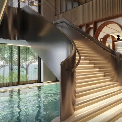 Godrej Epoque, artistic impression A curved staircase beside an indoor pool in the club café of Godrej Epoque
